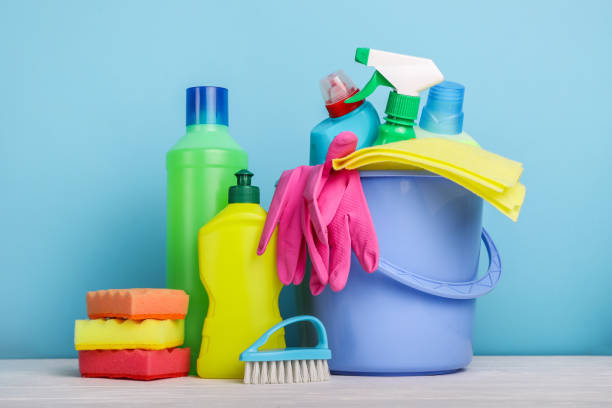 Set of cleaning products on blue background